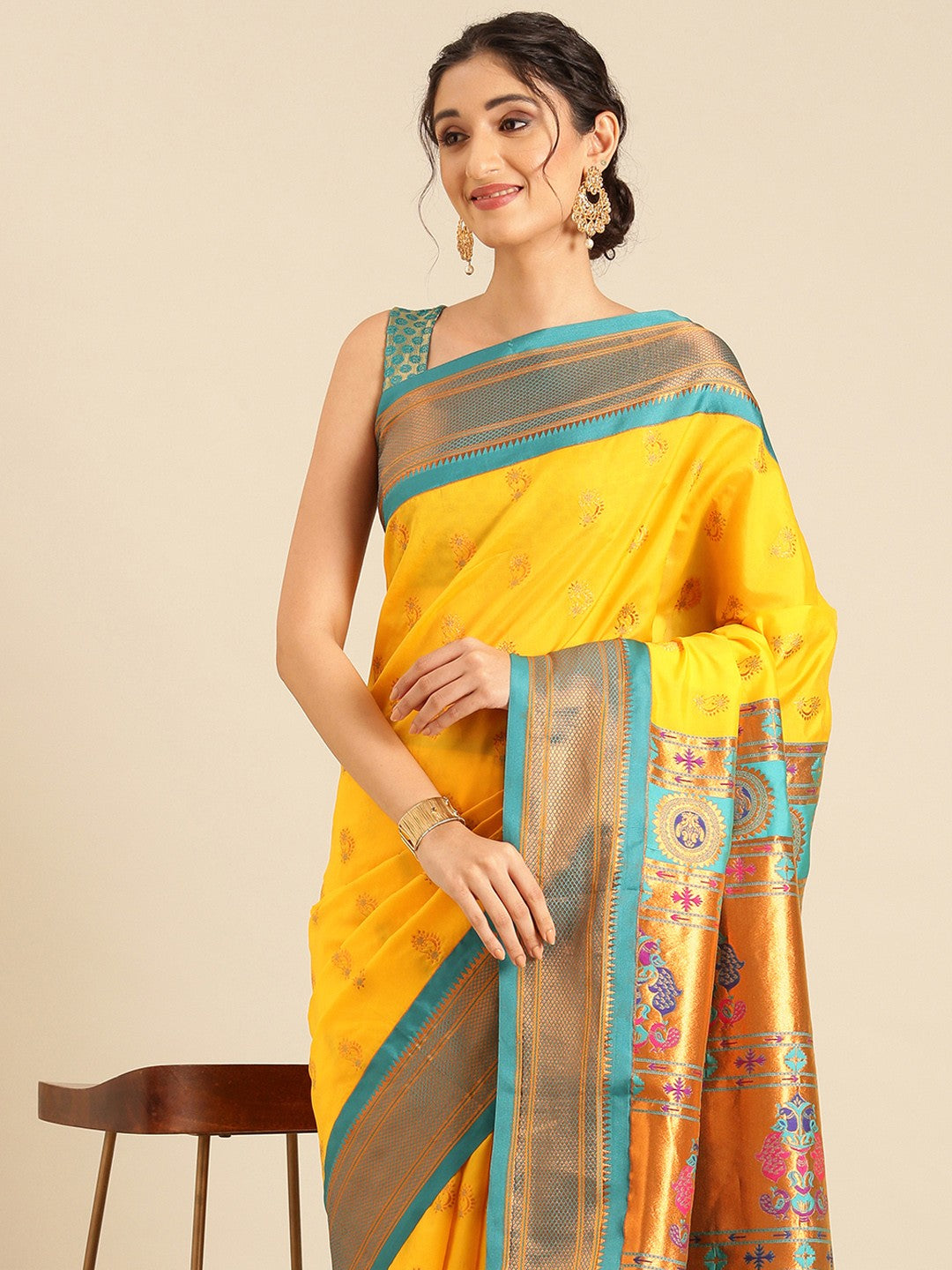 Rich yellow with green polls paithani